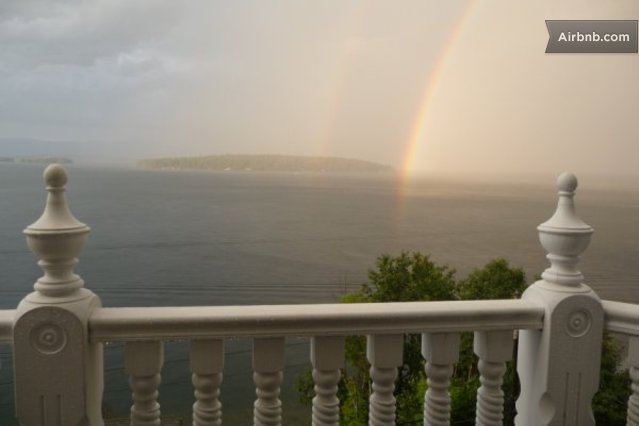 Beautiful view of a rainbow over the lake from the deck.
